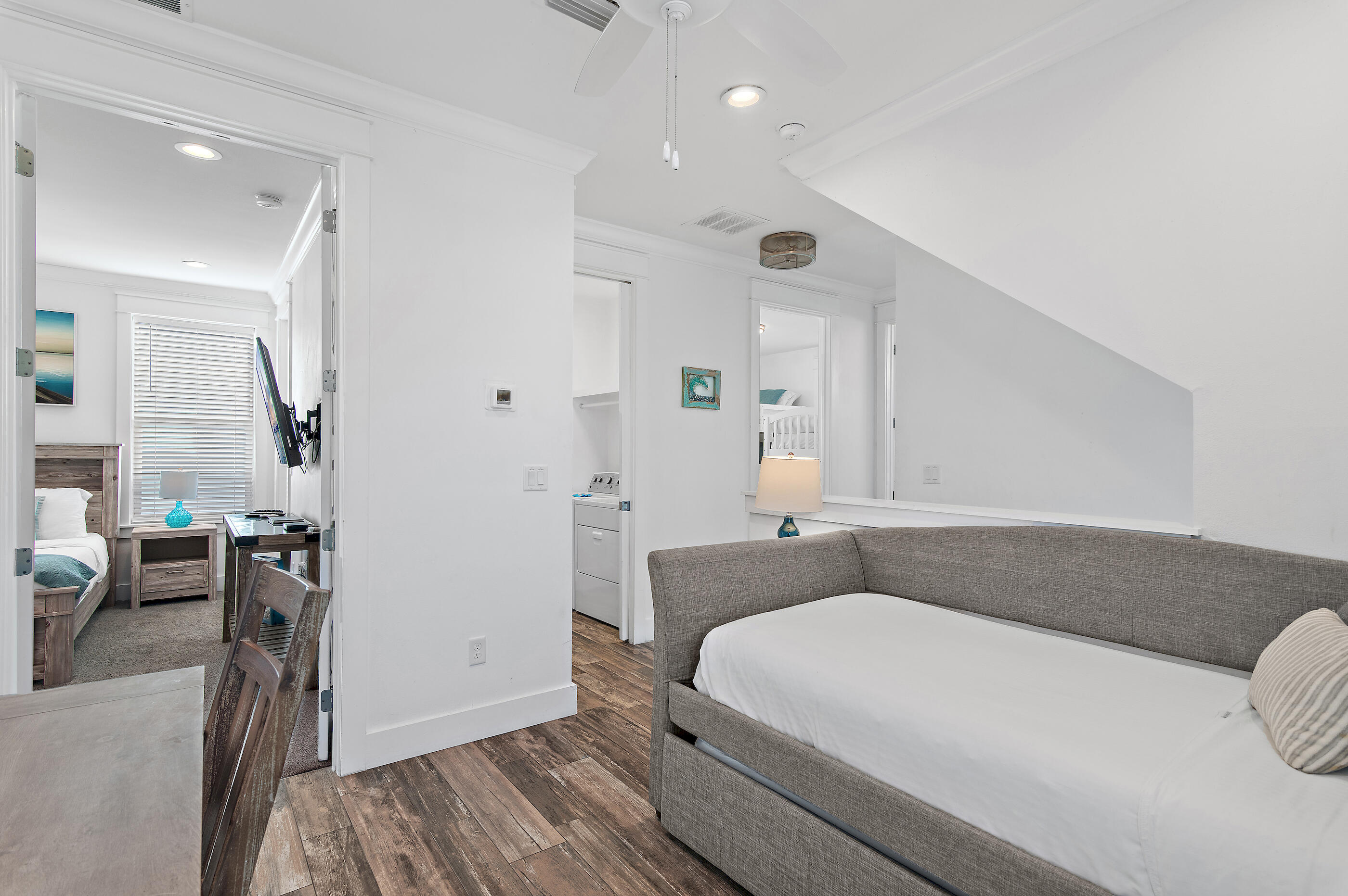 33 Sugar Sand Lane Santa Rosa Beach, FL 32459 - Photo 19 of 35 a bedroom with a bed and a table