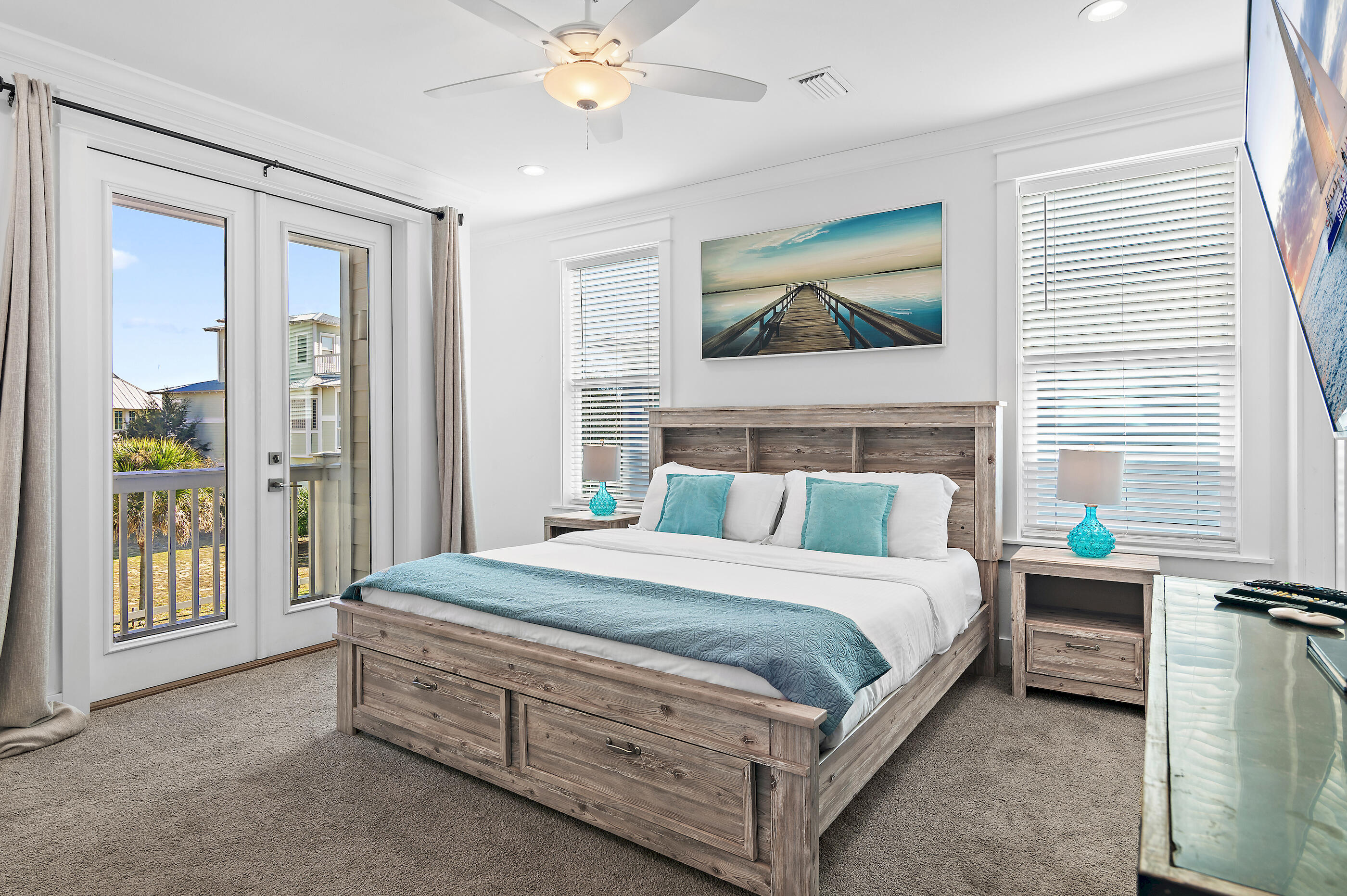 33 Sugar Sand Lane Santa Rosa Beach, FL 32459 - Photo 21 of 35 a bedroom with a bed wooden floor and window