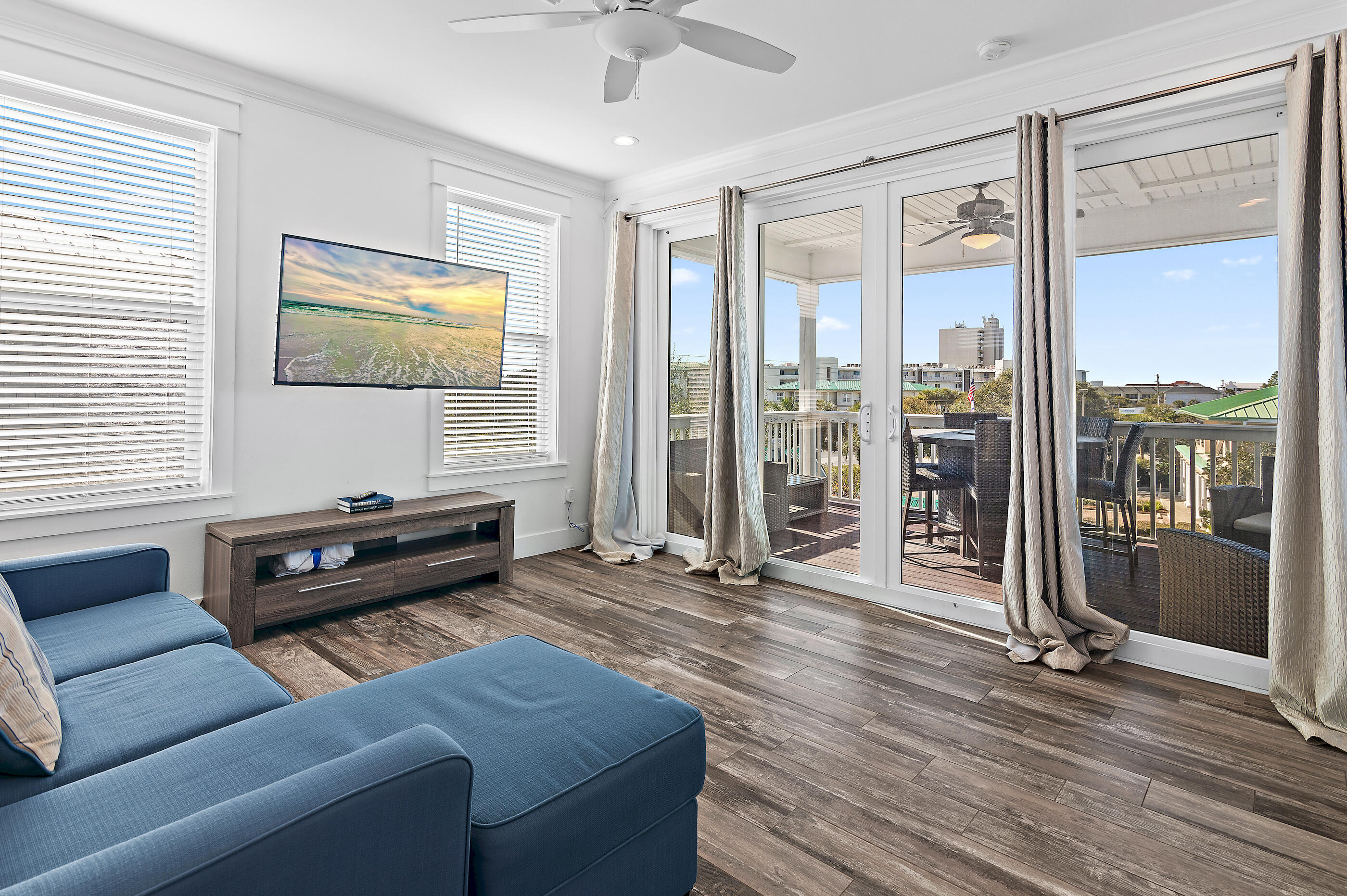 33 Sugar Sand Lane Santa Rosa Beach, FL 32459 - Photo 27 of 35 a living room with furniture and a flat screen tv