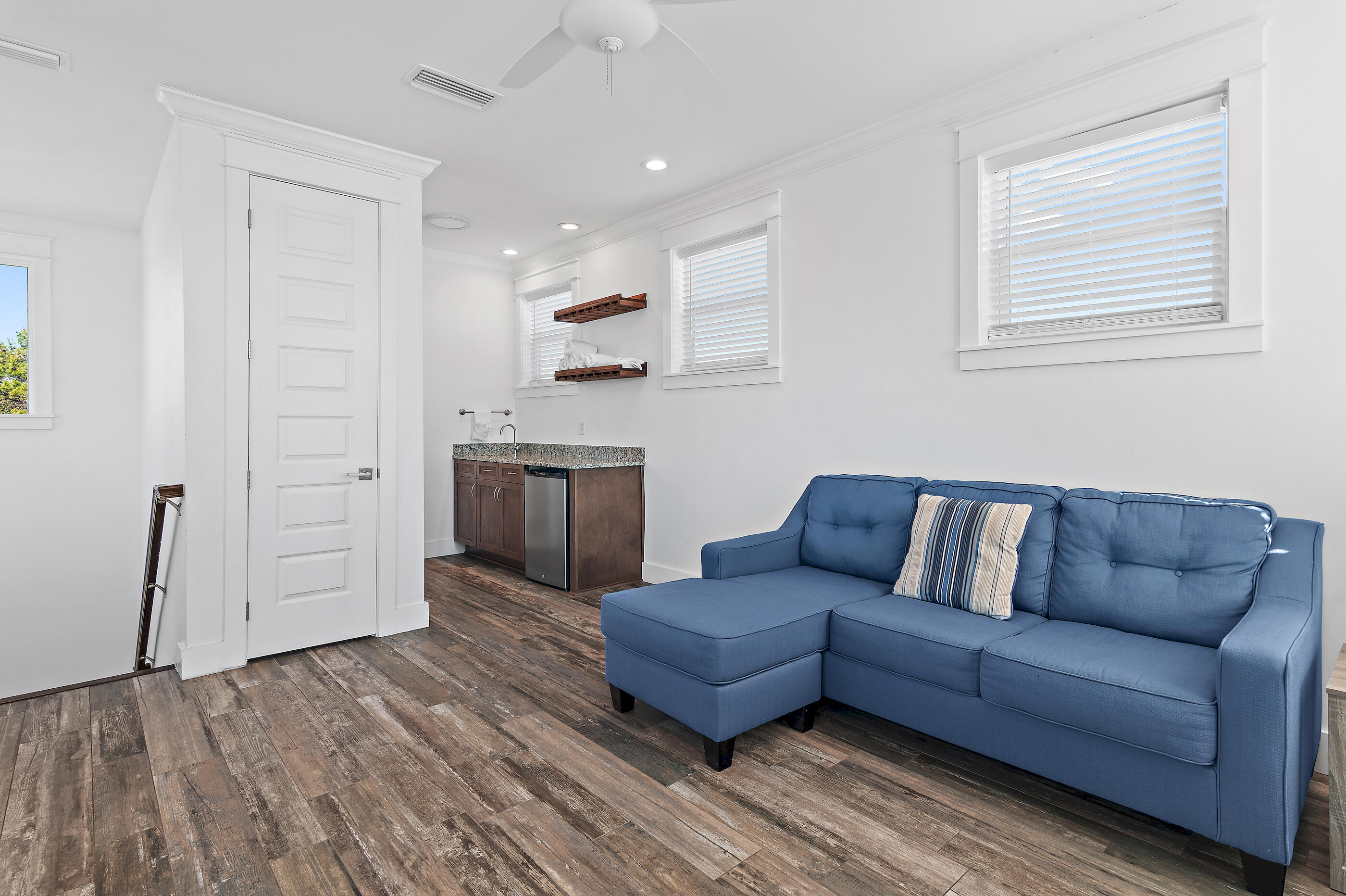 33 Sugar Sand Lane Santa Rosa Beach, FL 32459 - Photo 28 of 35 a living room with furniture and a wooden floor