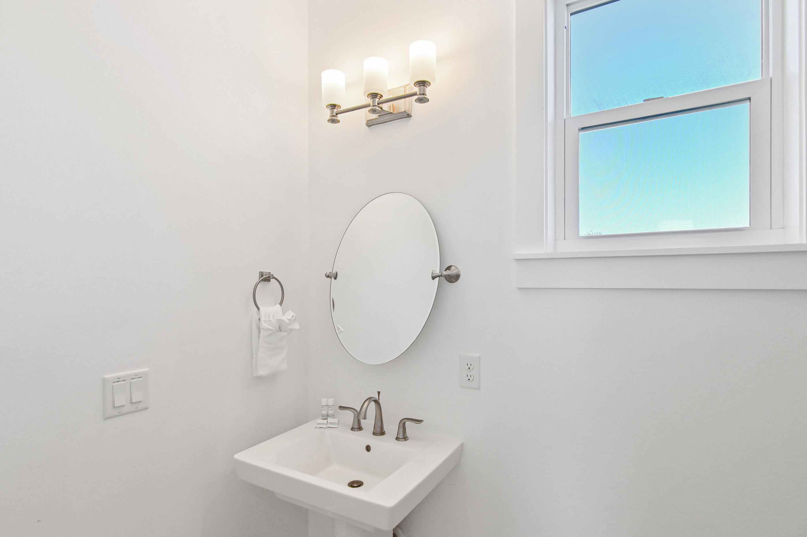 33 Sugar Sand Lane Santa Rosa Beach, FL 32459 - Photo 30 of 35 a bathroom with a sink and a mirror