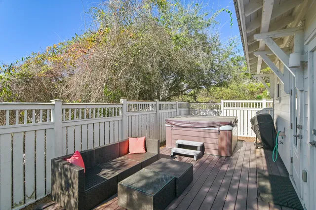 a view of a deck with furniture