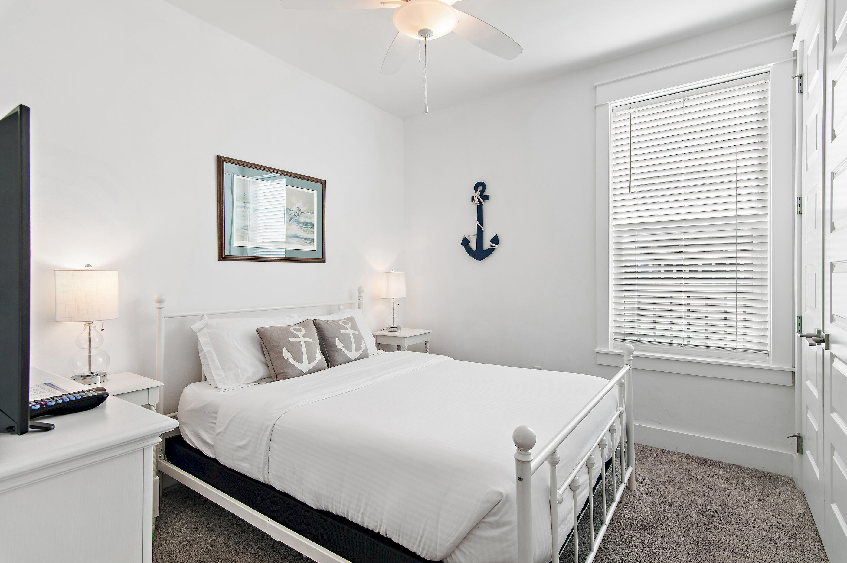 33 Sugar Sand Lane Santa Rosa Beach, FL 32459 - Photo 10 of 35 a bedroom with a bed and a window