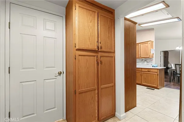 a view of a bathroom with a tub and mirror