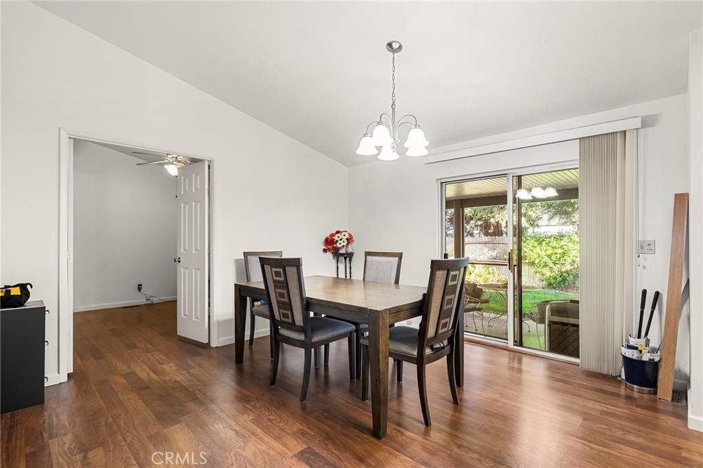 2050 Springfield Drive, Unit 323 Chico, CA 95928 - Photo 20 of 43 a view of a dining room with furniture window and wooden floor