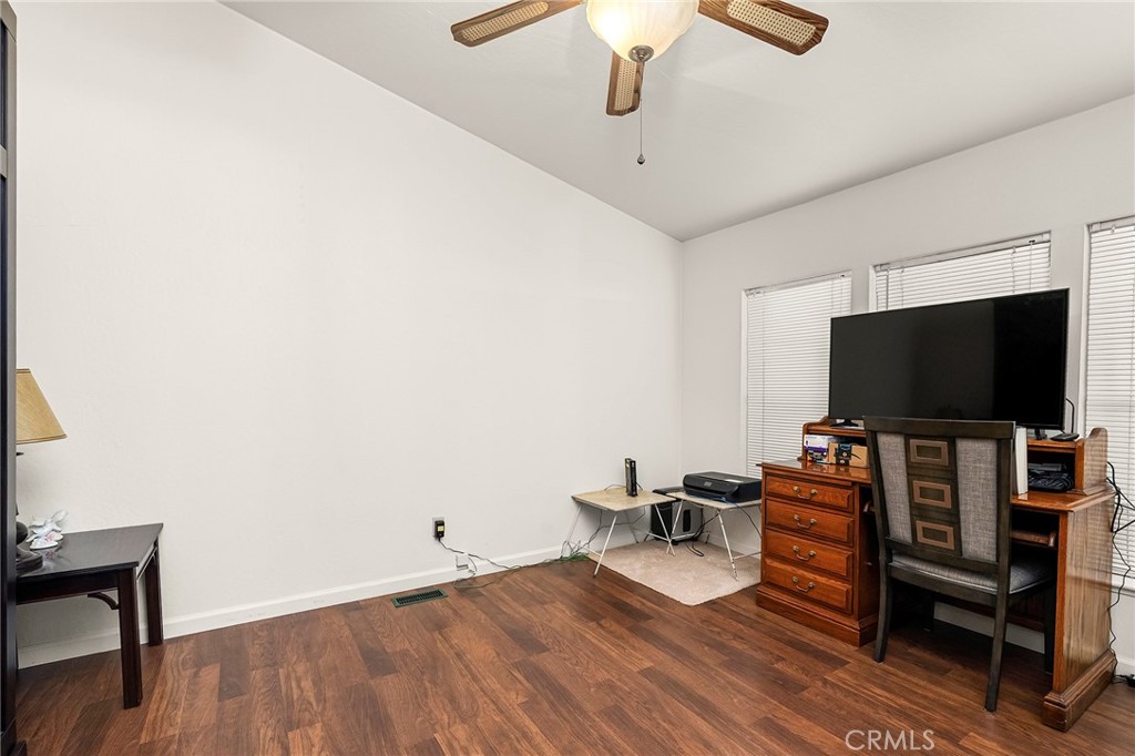 2050 Springfield Drive, Unit 323 Chico, CA 95928 - Photo 22 of 43 a living room with furniture and a flat screen tv
