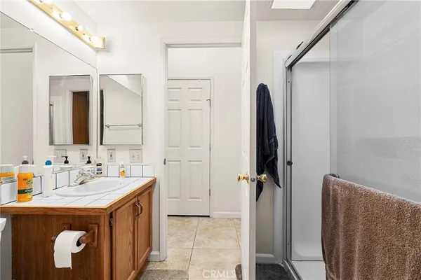 a bathroom with a sink and mirror