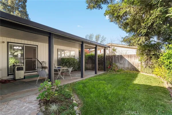 a house view with a garden space