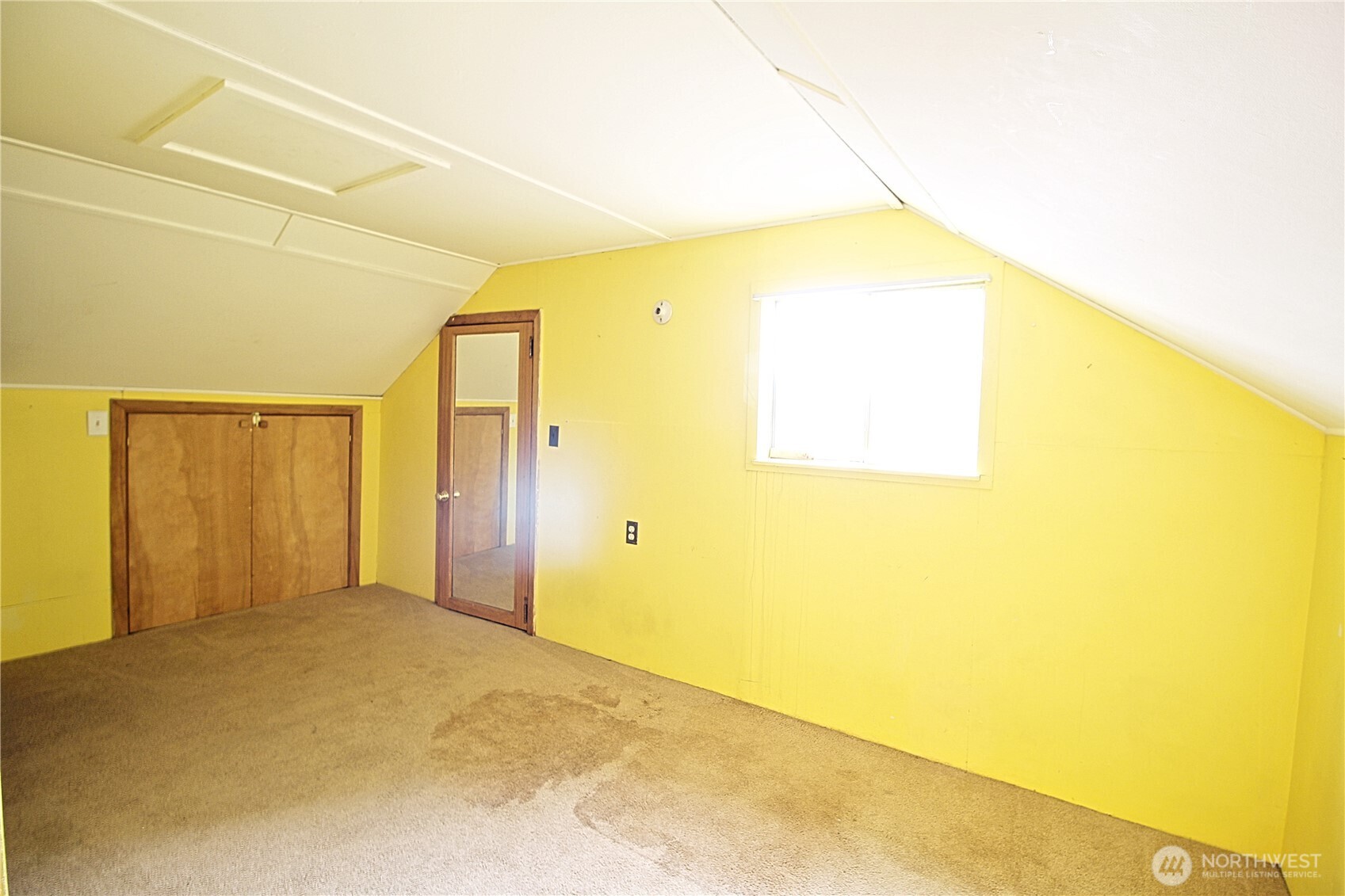 126 East 64th Street Tacoma, WA 98404 - Photo 22 of 36 a view of a big room with wooden floor