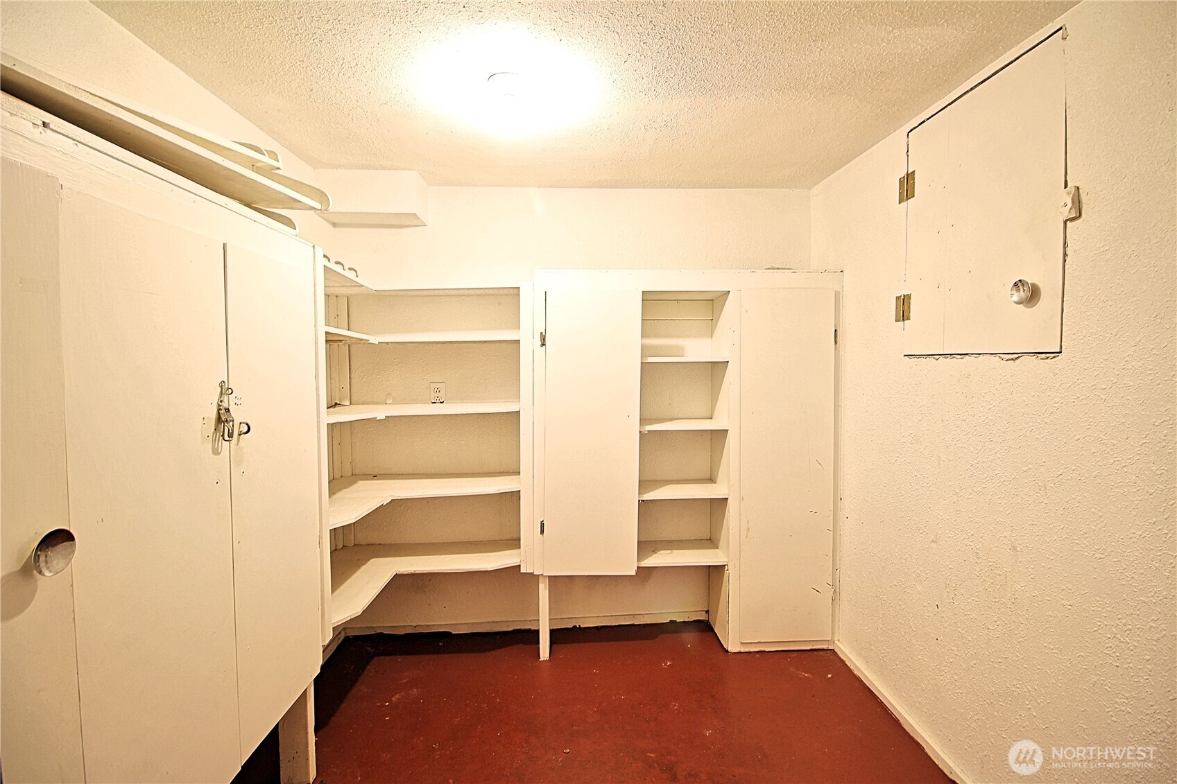 126 East 64th Street Tacoma, WA 98404 - Photo 31 of 36 a view of walk in closet with empty racks