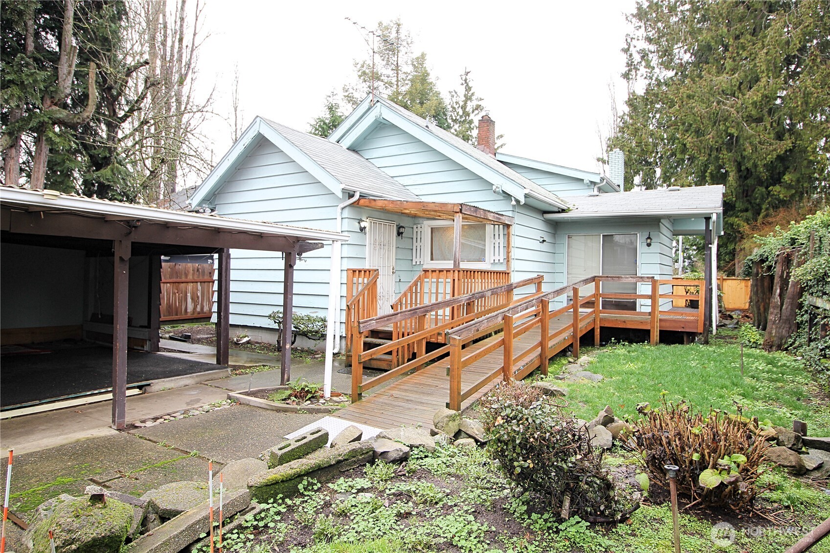 126 East 64th Street Tacoma, WA 98404 - Photo 34 of 36 a view of a house with backyard and porch