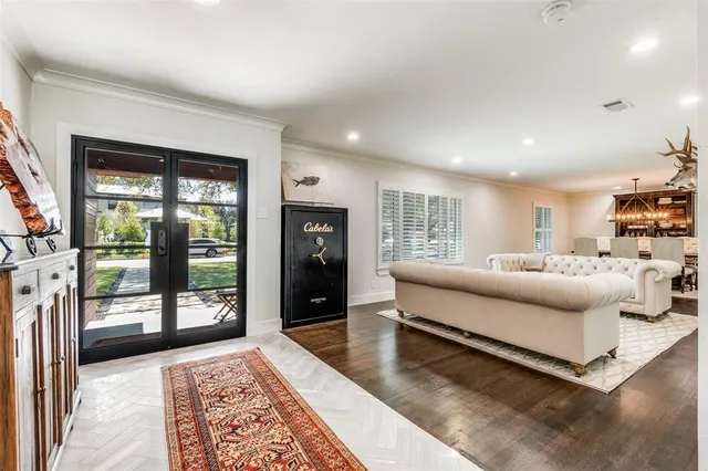 a living room with furniture and a rug