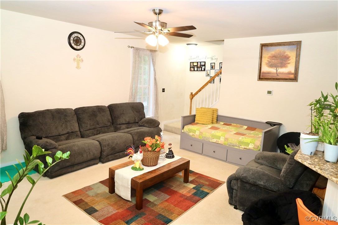 862 Club Ridge Court Chester, VA 23836 - Photo 14 of 50 Living room with carpet floors and ceiling fan