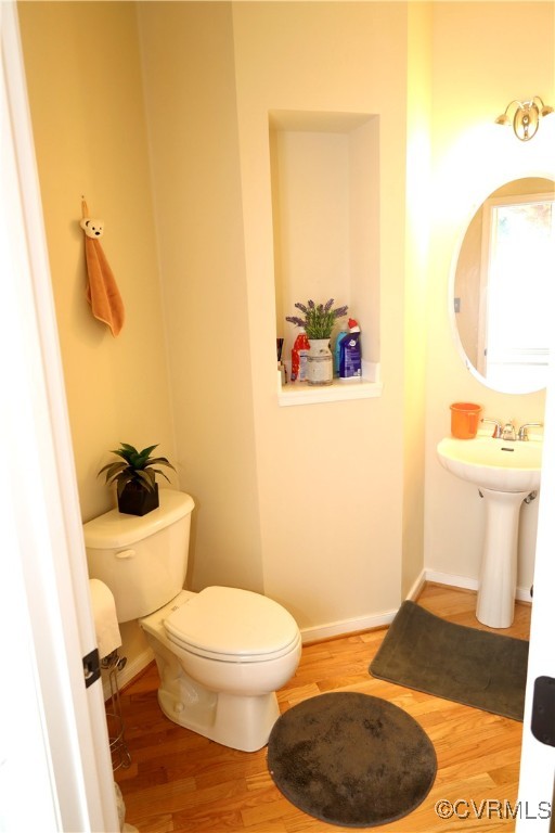 862 Club Ridge Court Chester, VA 23836 - Photo 20 of 50 Bathroom with wood-type flooring and toilet