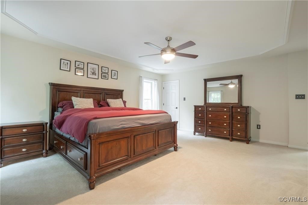 862 Club Ridge Court Chester, VA 23836 - Photo 22 of 50 Bedroom with light carpet and ceiling fan