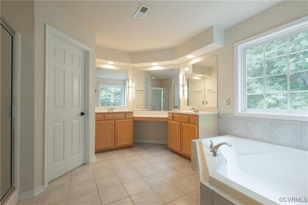 862 Club Ridge Court Chester, VA 23836 - Photo 24 of 50 Bathroom with vanity, independent shower and bath,