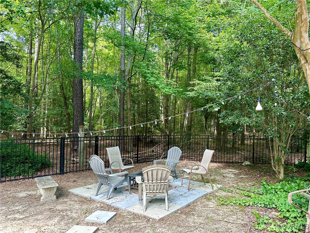 862 Club Ridge Court Chester, VA 23836 - Photo 41 of 50 View of patio / terrace with an outdoor fire pit