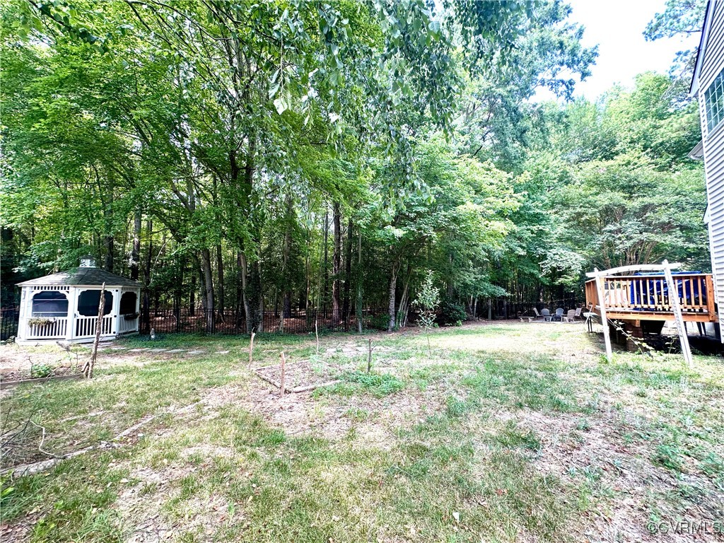 862 Club Ridge Court Chester, VA 23836 - Photo 43 of 50 View of yard with a wooden deck and a gazebo
