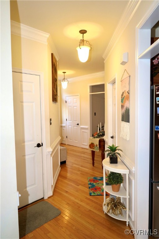 862 Club Ridge Court Chester, VA 23836 - Photo 8 of 50 Corridor with ornamental molding and light wood-ty