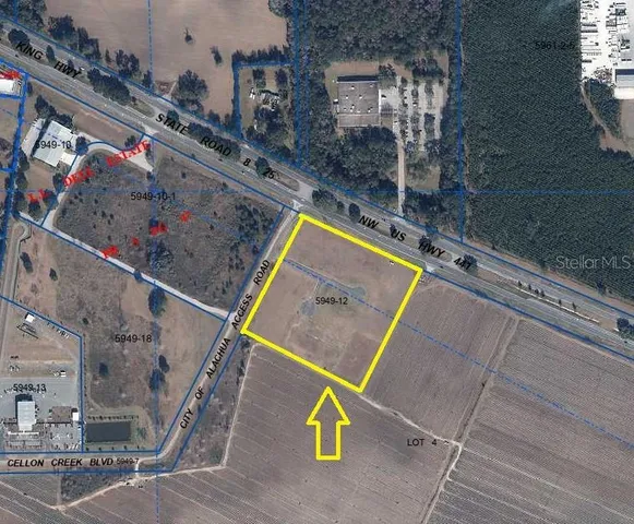 a view of swimming pool with seating area