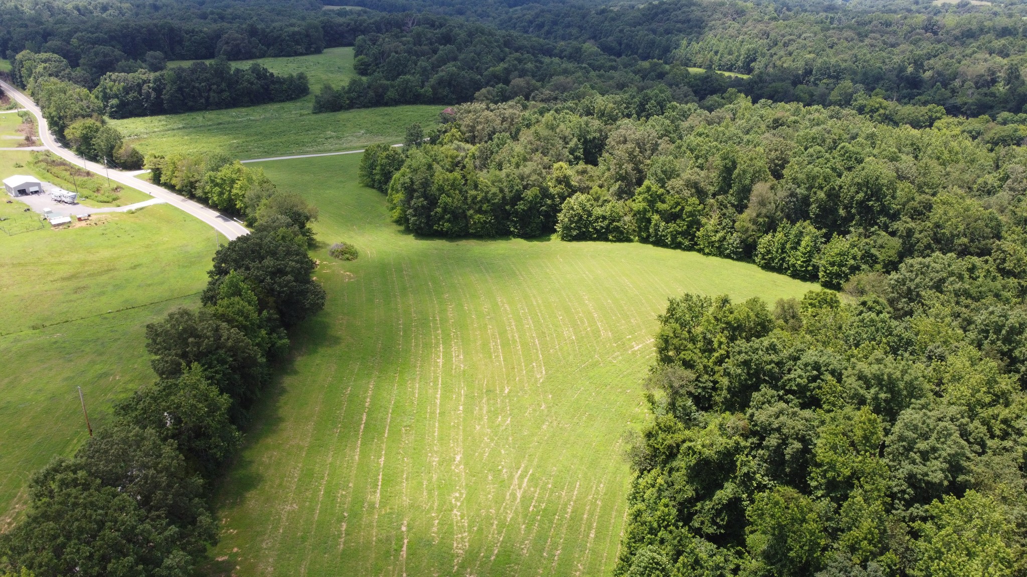 16 Hayes Ridge Road Indian Mound, TN 37079 - Photo 4 of 12 a view of a garden with a wooden fence
