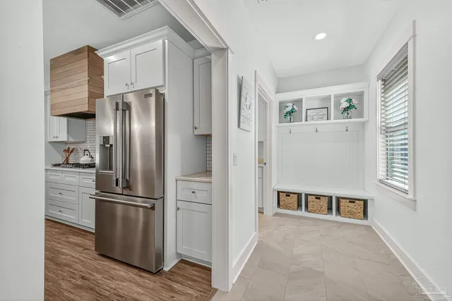 a kitchen with sink and cabinets