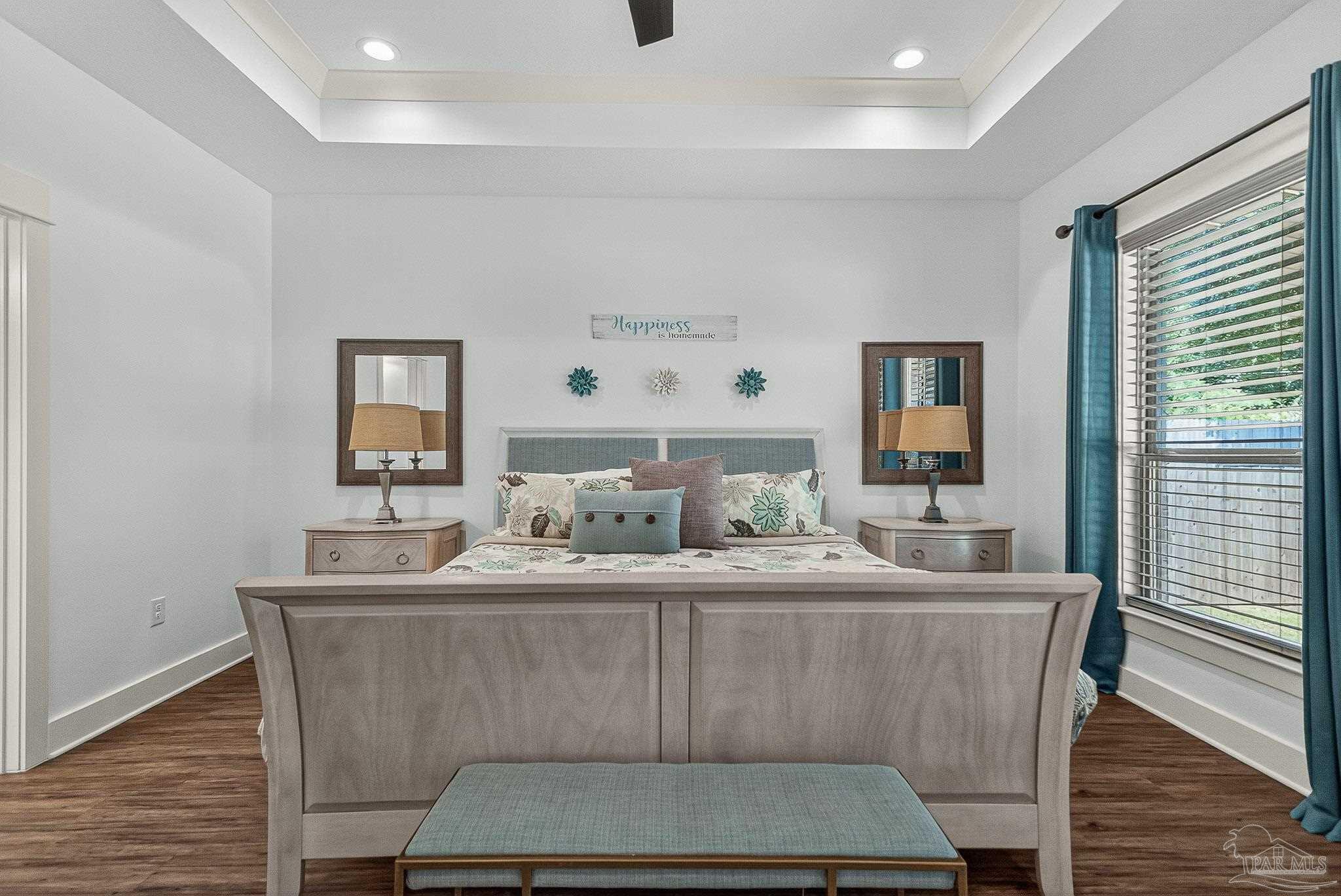 2480 Carthage Court Cantonment, FL 32533 - Photo 31 of 59 a dining room with furniture and wooden floor