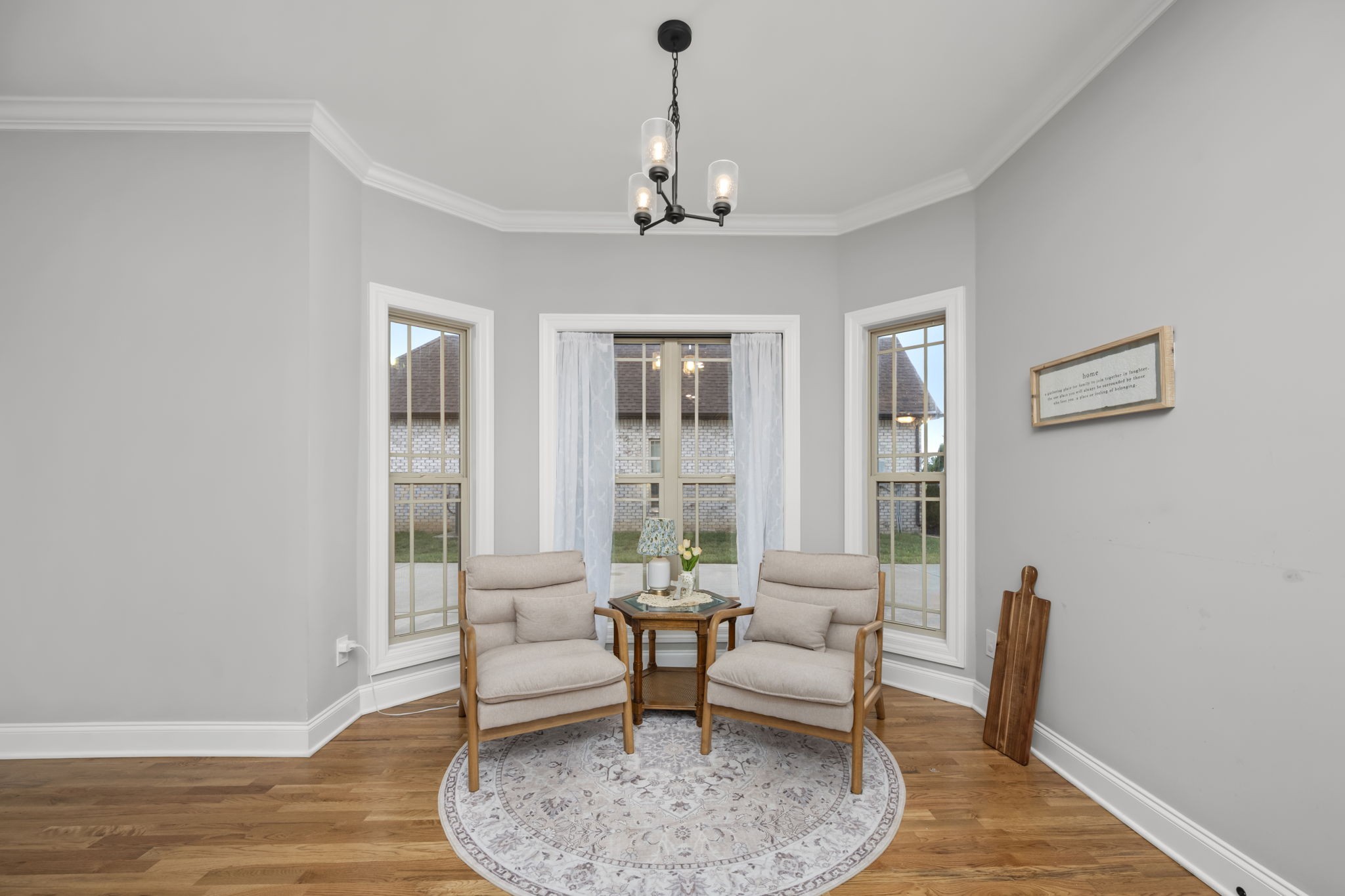 810 Walnut Grove Road Christiana, TN 37037 - Photo 26 of 48 a living room with furniture and a chandelier