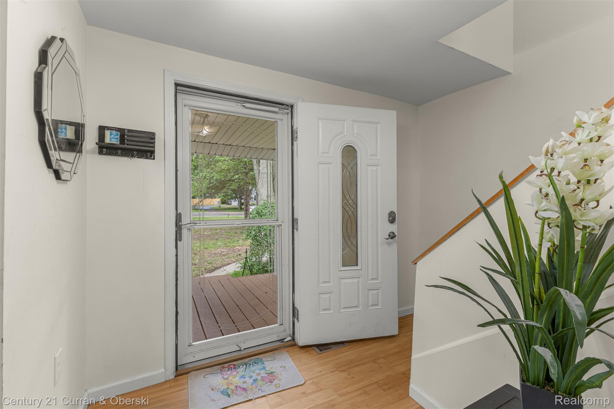 18491 Savage Road Belleville, MI 48111 - Photo 8 of 49 Entryway with wood-finish flooring and light-colored walls