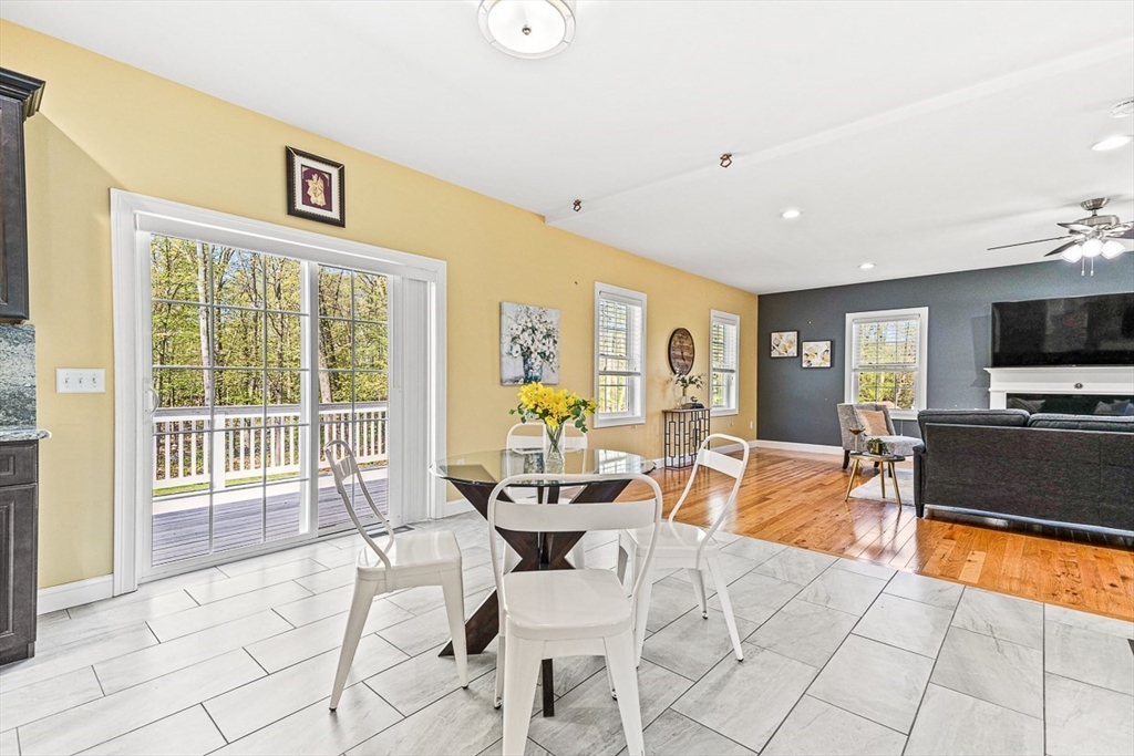 96 Clement Road Dracut, MA 01826 - Photo 13 of 41 a view of a livingroom with furniture window and outside view