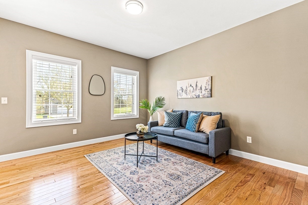 96 Clement Road Dracut, MA 01826 - Photo 19 of 41 a living room with furniture and a rug