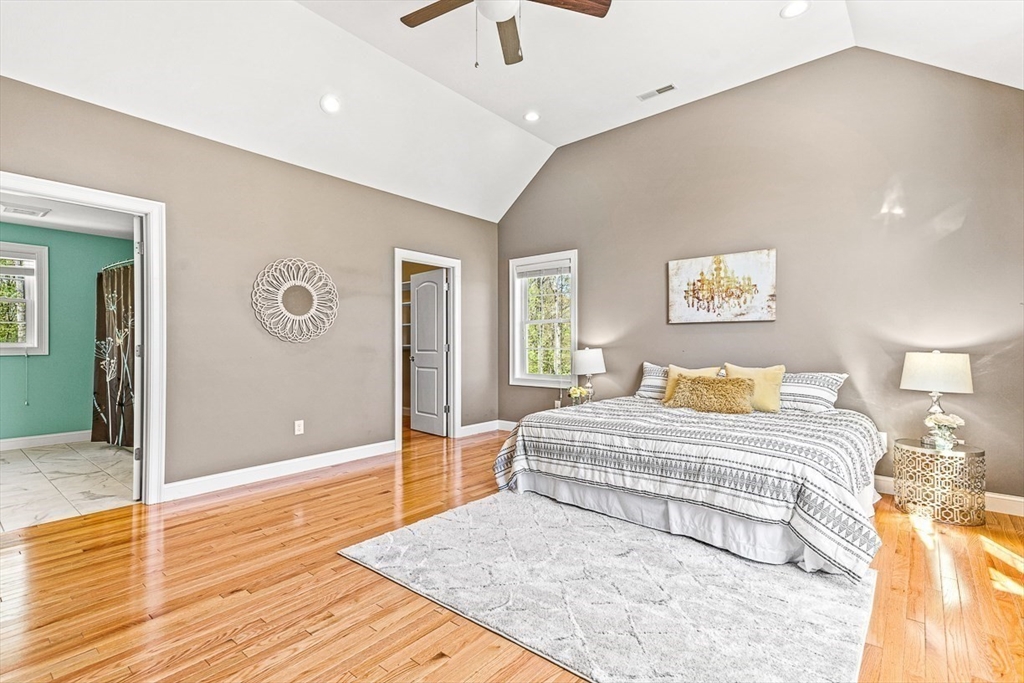 96 Clement Road Dracut, MA 01826 - Photo 24 of 41 a bedroom with a bed and a dresser