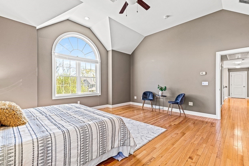 96 Clement Road Dracut, MA 01826 - Photo 25 of 41 a bedroom with a bed and a table