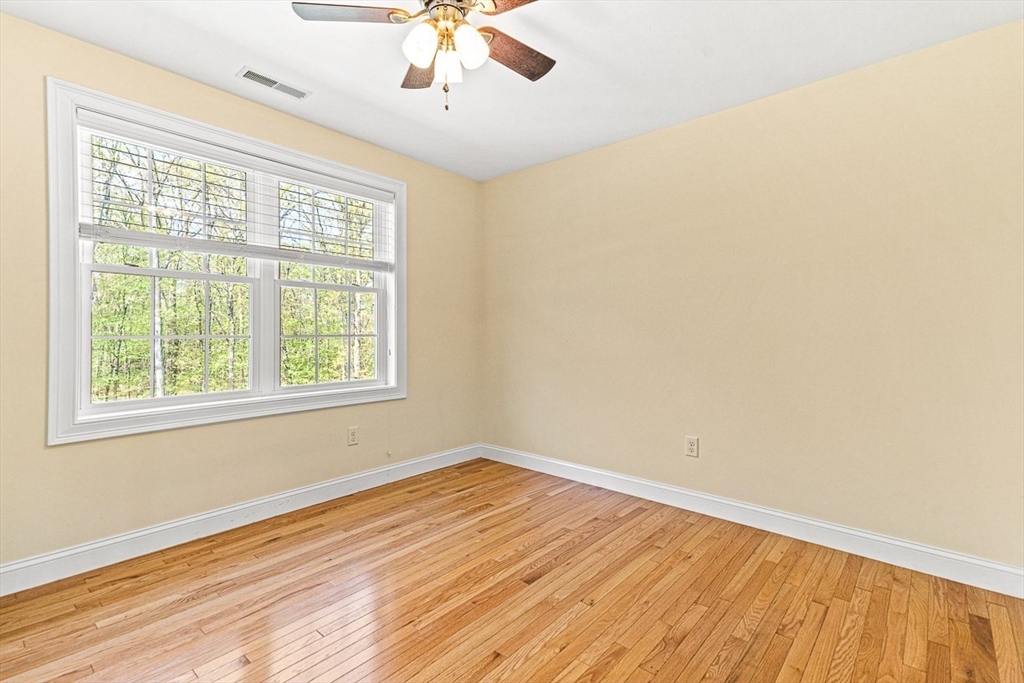 96 Clement Road Dracut, MA 01826 - Photo 31 of 41 wooden floor in an empty room with a window