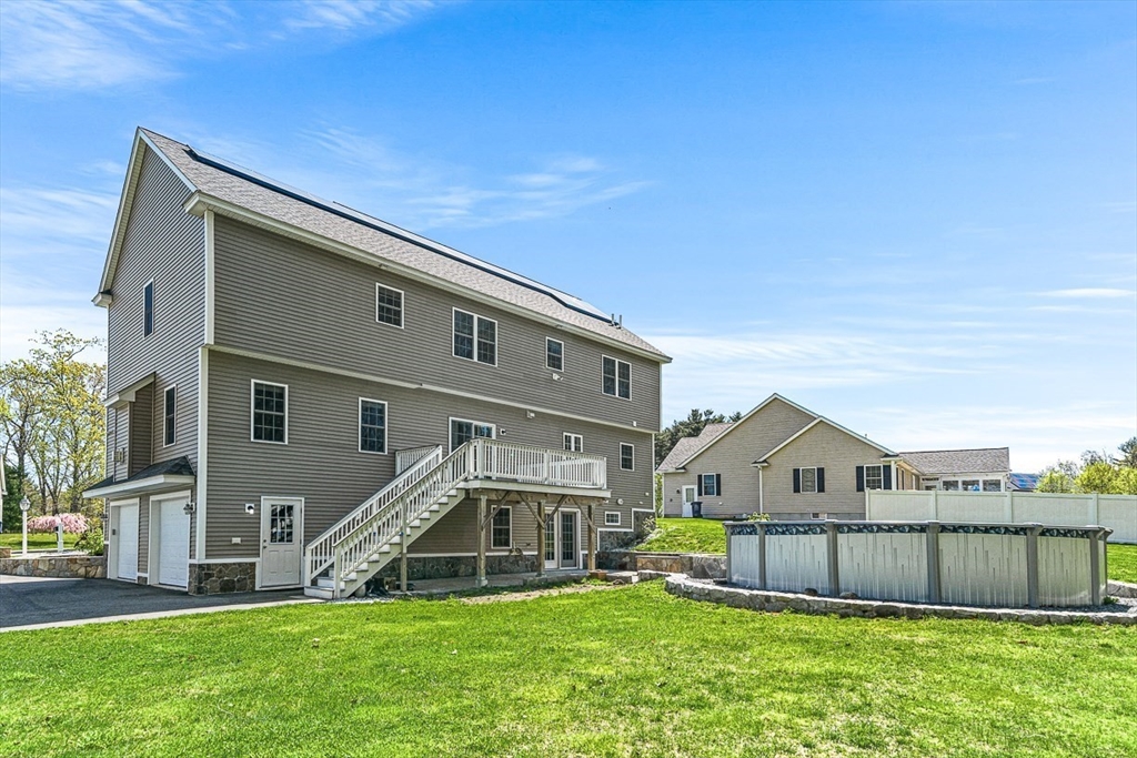 96 Clement Road Dracut, MA 01826 - Photo 38 of 41 a view of a yard in front of a house
