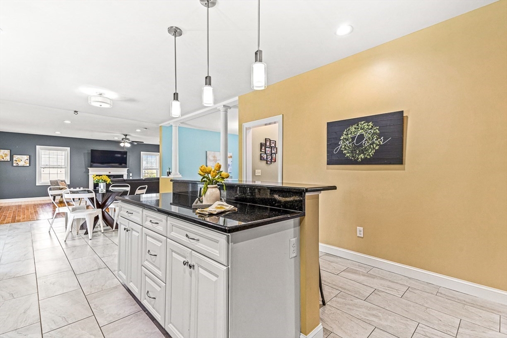 96 Clement Road Dracut, MA 01826 - Photo 7 of 41 a kitchen with a sink and cabinets