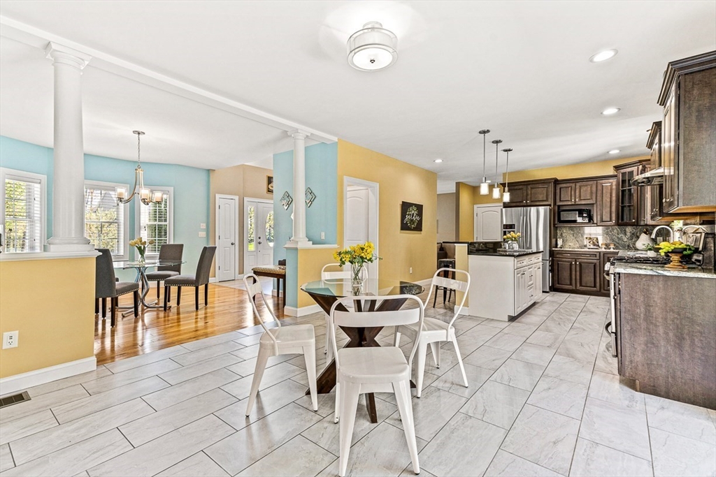 96 Clement Road Dracut, MA 01826 - Photo 8 of 41 a view of a dining room with furniture