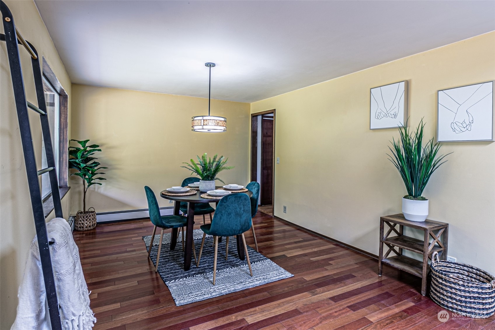 20462 98th Place South Kent, WA 98031 - Photo 11 of 31 a view of a dining room with furniture and wooden floor