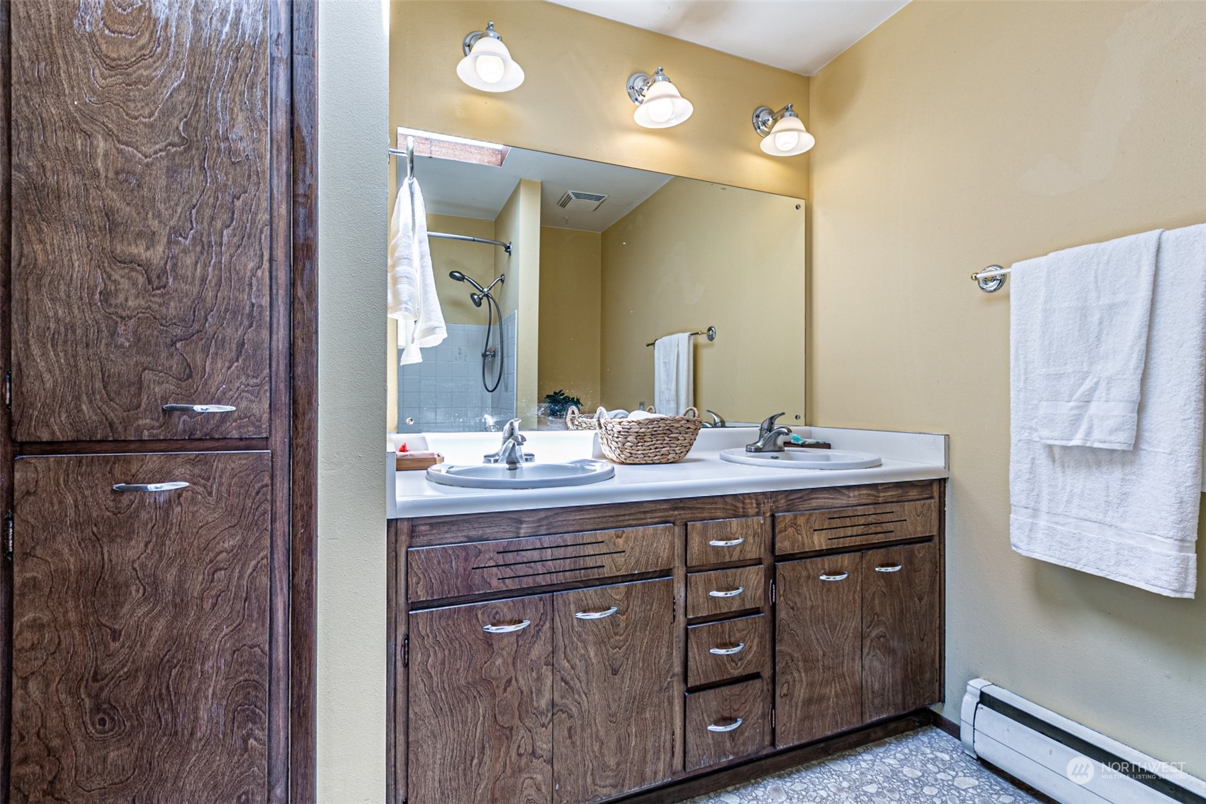 20462 98th Place South Kent, WA 98031 - Photo 14 of 31 a bathroom with a double vanity sink and mirror