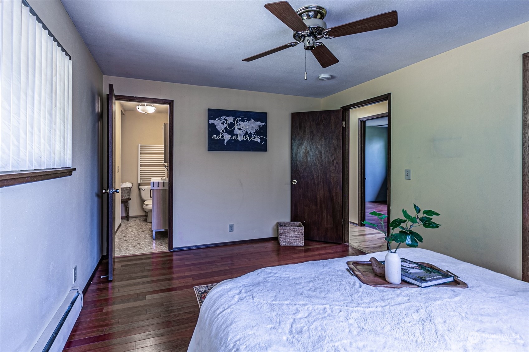 20462 98th Place South Kent, WA 98031 - Photo 19 of 31 a bedroom with a bed and a potted plant