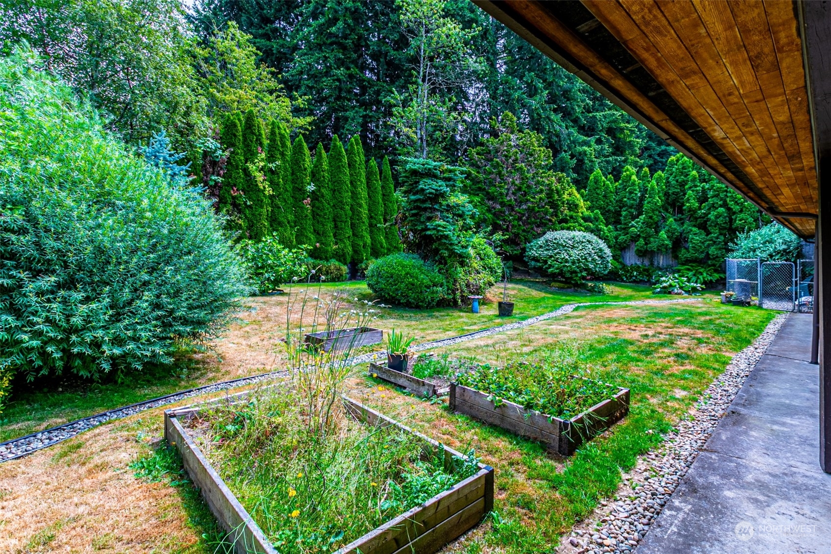 20462 98th Place South Kent, WA 98031 - Photo 26 of 31 a view of a garden with an outdoor space