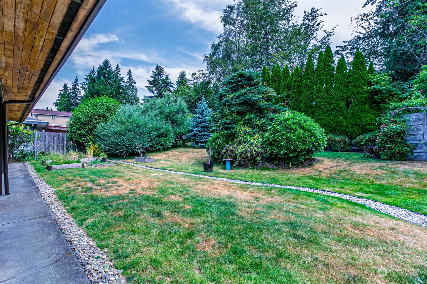 20462 98th Place South Kent, WA 98031 - Photo 27 of 31 a view of a backyard with a garden