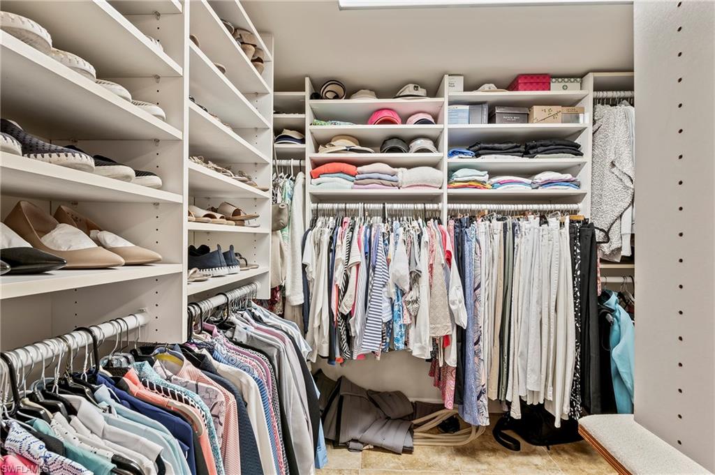 4155 Crayton Road, Unit 107 Naples, FL 34103 - Photo 21 of 36 View of walk in closet