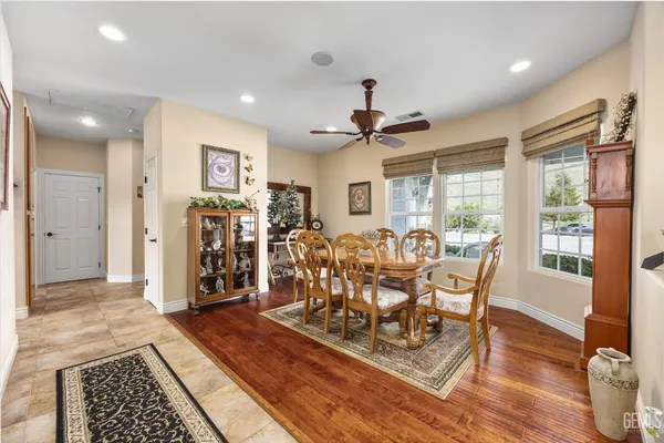 a utility room with sink dryer and washer