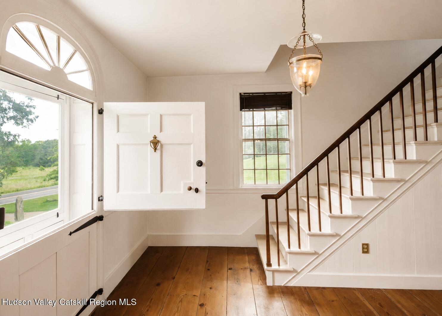 652 Albany Post Road New Paltz, NY 12561 - Photo 6 of 36 a view of an entryway with wooden floor