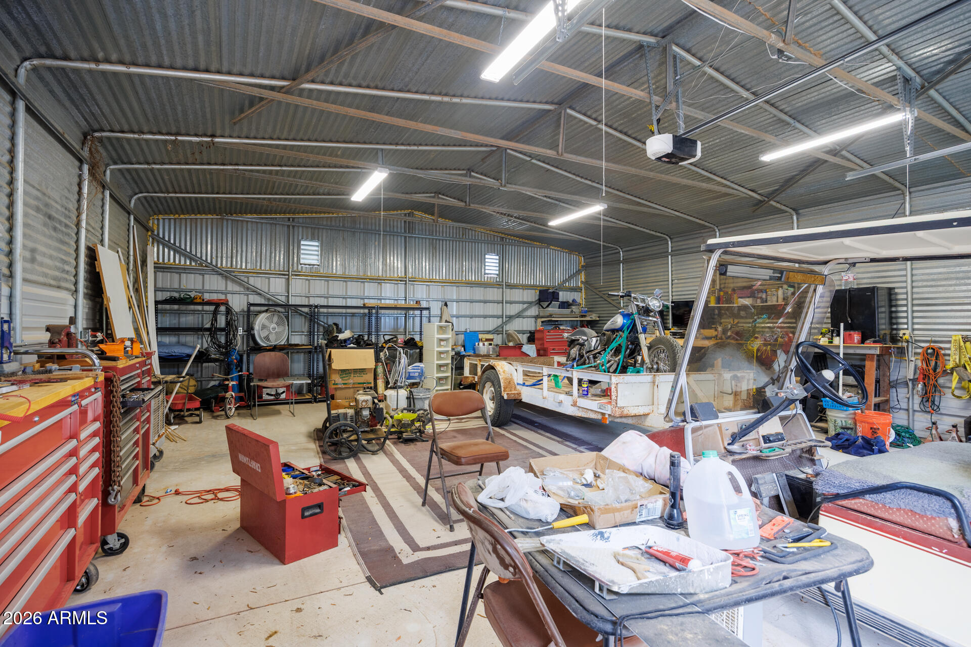 6185 East Monitor Street Picacho, AZ 85141 - Photo 23 of 55 a view of a storage room with a lot of stuff