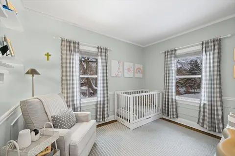 a room with a couch and a window