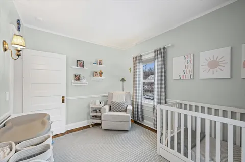 a bedroom with a couch and a couch