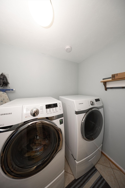 49 Dennis Whitney Road Oakham, MA 01068 - Photo 13 of 40 a utility room with dryer and washer