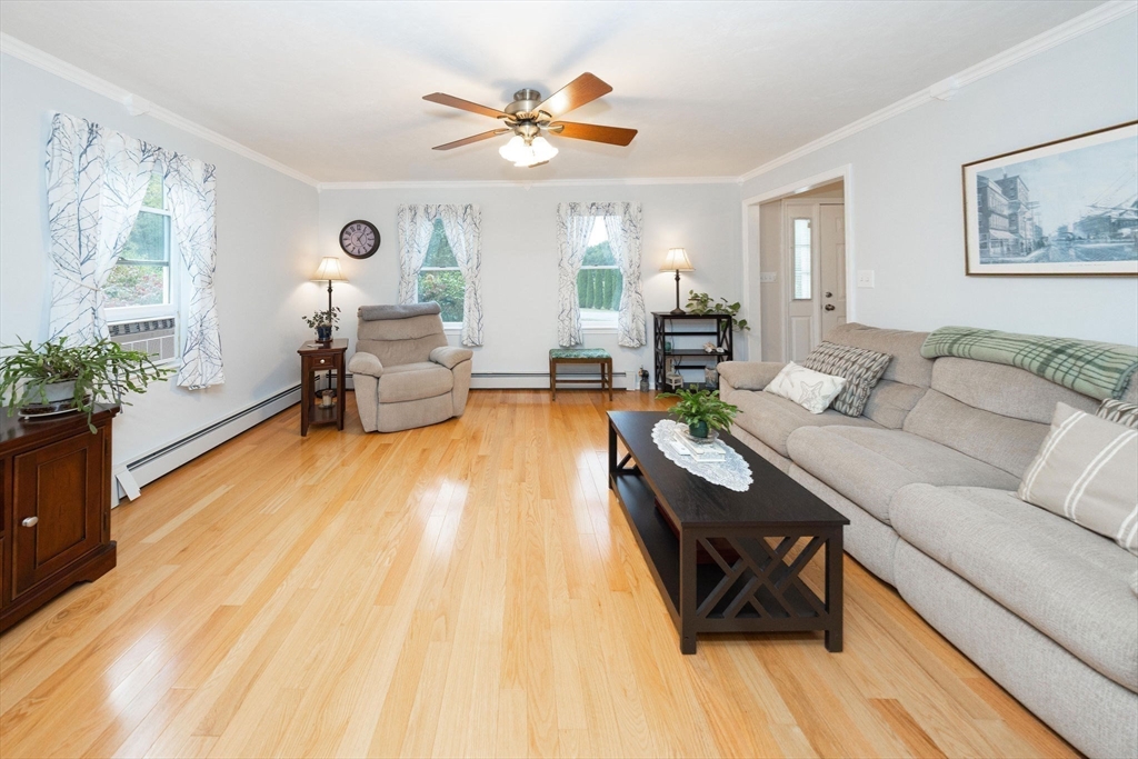 49 Dennis Whitney Road Oakham, MA 01068 - Photo 15 of 40 a living room with furniture and wooden floor